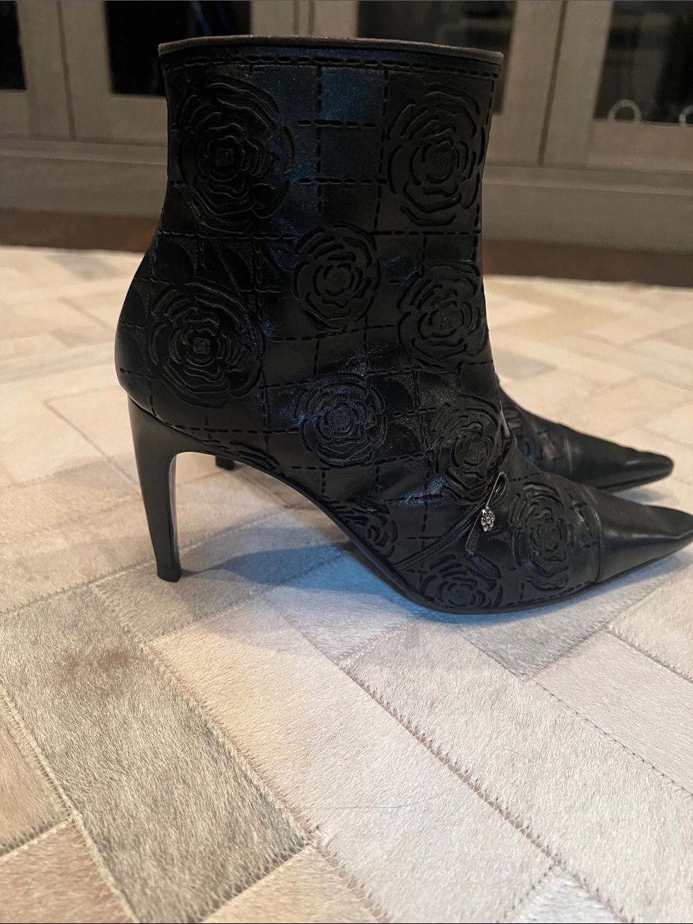 Chanel black leather Camelia boots size 37